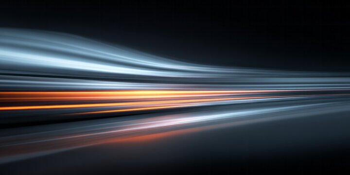 Abstract visual depiction of dynamic light streaks moving rapidly toward the horizon