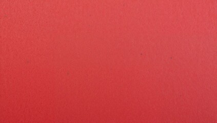 Filling red textured surface occupying entire frame on painted wall at studio, with fine grain