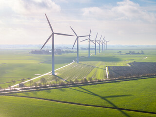 Aerial view of wind turbines in rural Friesland landscape
