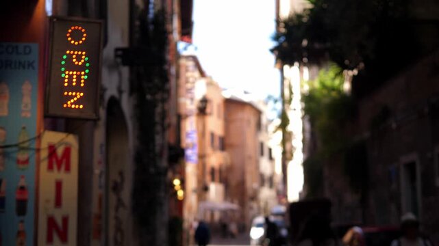 Open sign at a minimarket in Trastevere, Rome