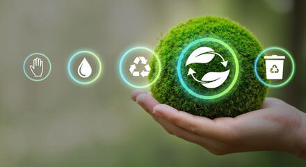 ESG concept with a hand holding a moss earth globe and environmental icons for sustainable business, CSR, and nature conservation.