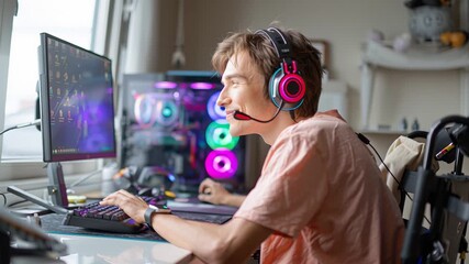 Gamer enjoying virtual experience on high-end pc with colorful led lights - Powered by Adobe