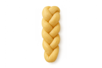 Uncooked braided challah bread dough preparing to bake