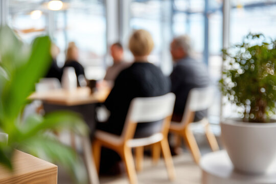 Defocused silhouettes inside a coworking conference room, focus on clean geometric patterns and neutral tones, with copy space