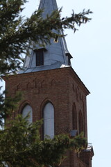 Fototapeta premium Landscape with a view of a picturesque church steeple.