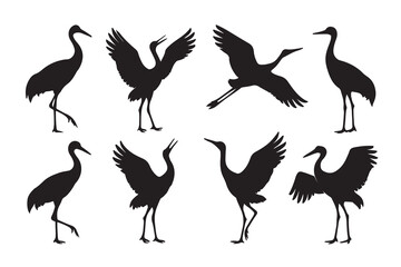 Naklejka premium Silhouettes of cranes in various poses against a white background