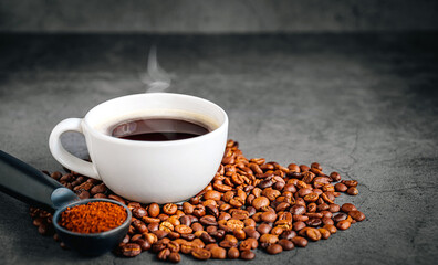 Coffee cup with coffee beans and ground coffee on gray background, Americano cup aromatic