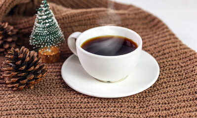 Cozy winter Coffee with pine cones and Chistmas tree decorationv
