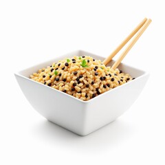 Square white bowl filled with couscous and black lentil mix, served with wooden chopsticks, isolated on white background