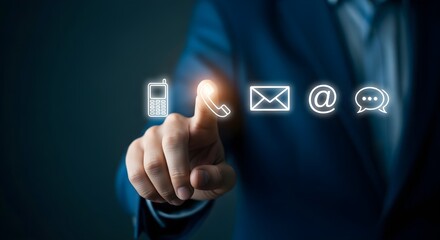 A man in a suit points to a glowing telephone icon, part of a series of communication symbols including phone, email, and chat.