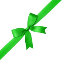Green ribbon with bow isolated on white background.