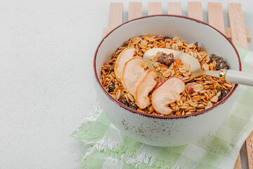 Vegan bowl with cereal granola with dried fruits. Ready to eat food, healthy breakfast concept