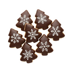 Chocolate frosted christmas tree cookies with white snowflakes
