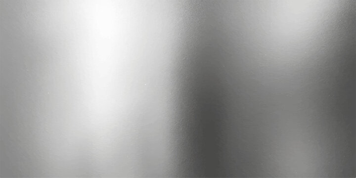 Shiny brushed steel or aluminium metal texture surface with light reflection makes a great metallic pattern backdrop or industrial wallpaper