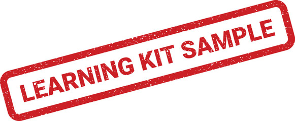 Distressed red rubber stamp with LEARNING KIT SAMPLE text signifying a component of an educational package