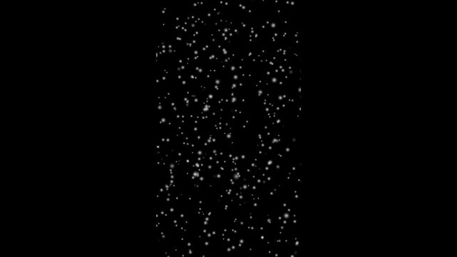 Flying through white shining stars . Christmas Snowfall Background Loop. snow flakes slowly falling densely against black background. Vertical animation of snow particles .