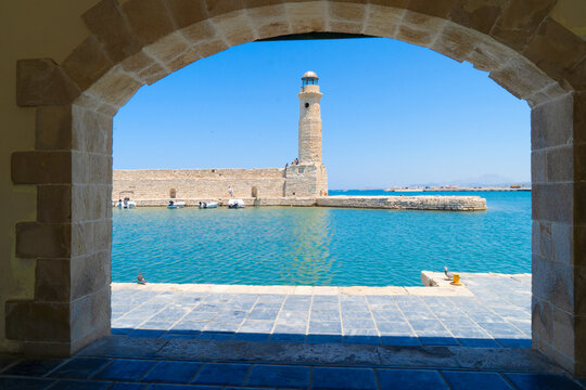 harbor and lighthouse of Rethymno old town, Crete, Greece, retro toned