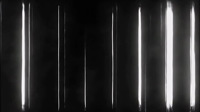Abstract black and white composition featuring vertical white light streaks against a dark background.