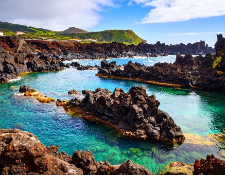 Volcanic pools meet turquoise water