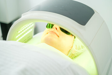 LED light therapy session for acne treatment in a calming spa environment