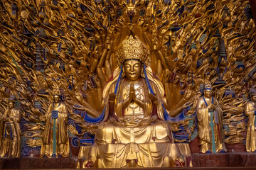 Dazu stone carving of the Thousand-Hand Guanyin located at the Baoding mountain Rock Carvings in Chongqing, China.