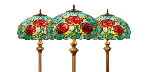 Three lamps with stained glass shades featuring roses and green foliage on brass bases