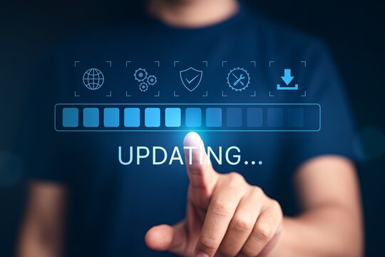 Software update concept. Hand touching a virtual progress bar for system upgrades, installation, and technology maintenance.