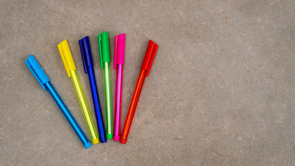 close-up of many colored pens
