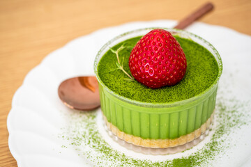 Indulgent matcha strawberry dessert home kitchen food photography cozy atmosphere close-up view culinary delight for sweet tooth