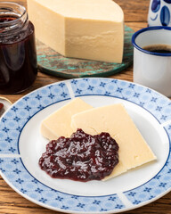 Meia cura cheese with jam and coffee