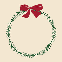 Round frame of fir branches with red bow