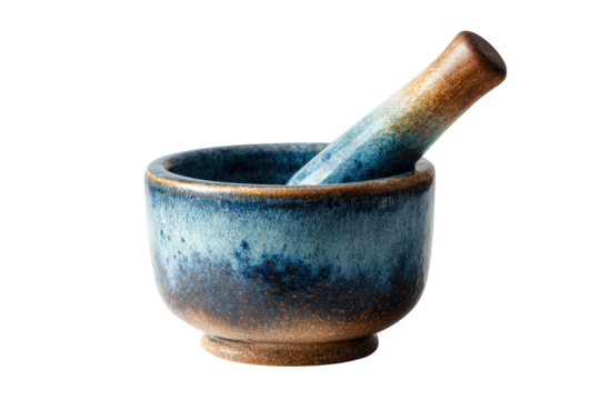 A ceramic mortar and pestle in shades of blue and brown, against a solid black background