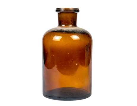 empty amber glass medicine bottle standing upright with narrow neck on isolated background
