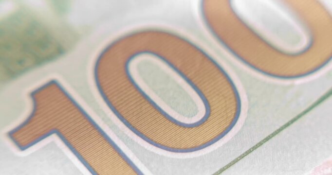Details and texture of a one hundred dollar bill