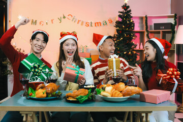 drinks and conversation, social gathering and get together. group and gift exchange at the event, celebration at home.