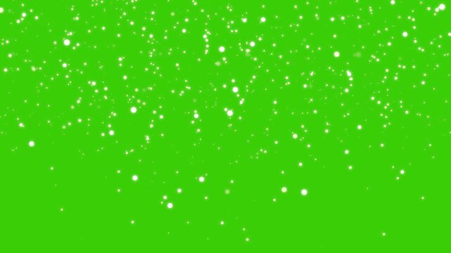 Golden Bokeh Light glitter sparkles Falling on green screen background. Glowing particles animation, Abstract shiny glitter dust Motion. Sparkle design elements for video editing. 4K Loop 