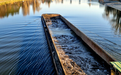 The tonnage of river freighters typically ranges from hundreds to several thousand tons, which is...