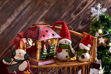 Christmas decoration with Vintage style lantern and snowman figurines