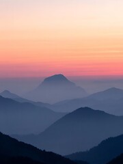 Naklejka premium Mountain landscape with layers silhouette at sunset gradient sky aerial view