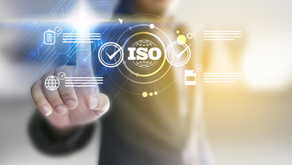 Businessman check quality assurance icon on digital screen with check mark icon for ISO certification and standardization. Quality assurance concept.