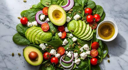Overhead view of a vibrant avocado and spinach salad dish