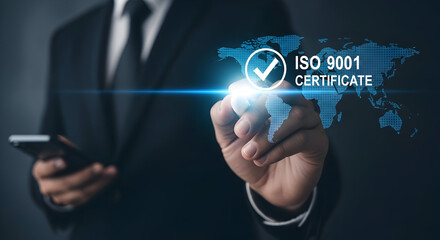 Fototapeta premium A modern businessman displays an ISO 9001 certificate on a digital interface, representing quality assurance and international standards for success.