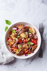 Italian panzanella with anchovies, olives and tomatoes.