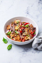 Italian panzanella with anchovies, olives and tomatoes.
