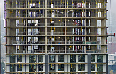 Front side of monolite concrete building under construction