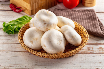 Raw white champignon mush heap