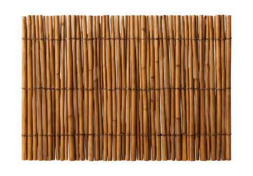 Natural reed fence enhancing the coastal charm of a beach house garden.