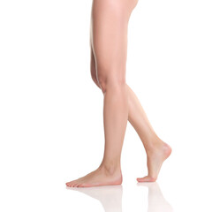 Side view of a woman’s legs and lower body in white underwear walking with smooth skin, studio...