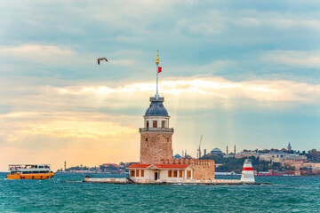 Fototapeta premium Maiden's Tower (or Kız Kulesi) against the dramatic sky.