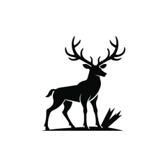 Black silhouette of a majestic stag with large antlers standing in grass isolated on white background